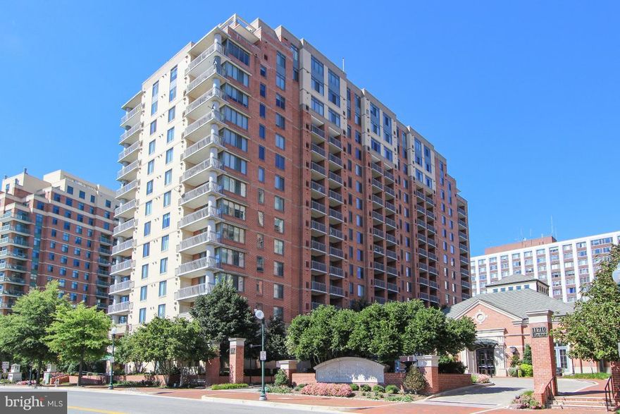 BACK ON THE MARKET! Spacious light-filled condo w/ balcony. New Samsung appliances & granite counter tops, new wood flrs, new modern bath, and fresh new paint throughout. 1 blk from Metro/Pike & Rose, min to 495, 270, mall. 1 assigned parking garage #367. Unit 10 ft from Elevator. Amenities incl pool, exercise room, pool table, study lounge, media rm, bbq grill, 24hr concierge, &Walk score: 87.