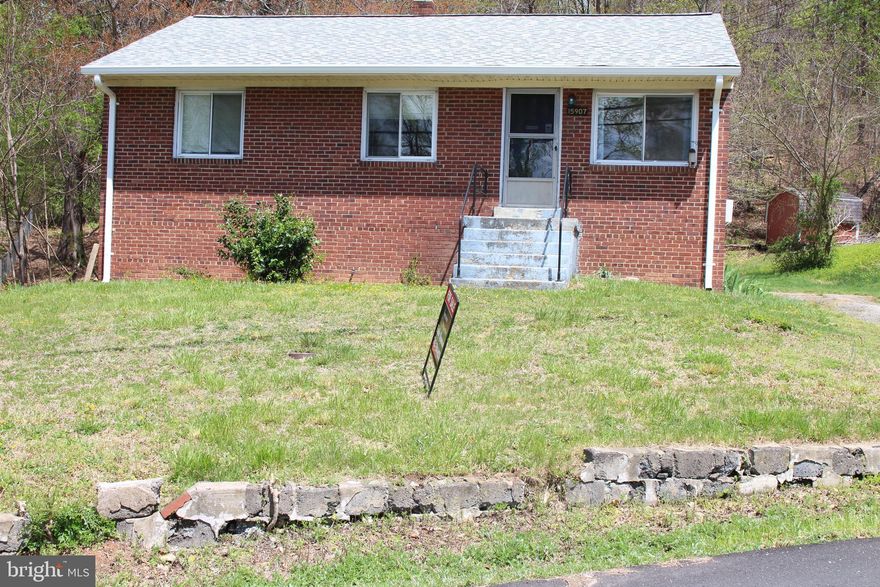 All brick rambler livable but in need of rehab. New roof, windows have been replaced. Large .49 acre lot.
Full unfinished basement.  Tankless hot water.  Washer and dryer convey "as is"