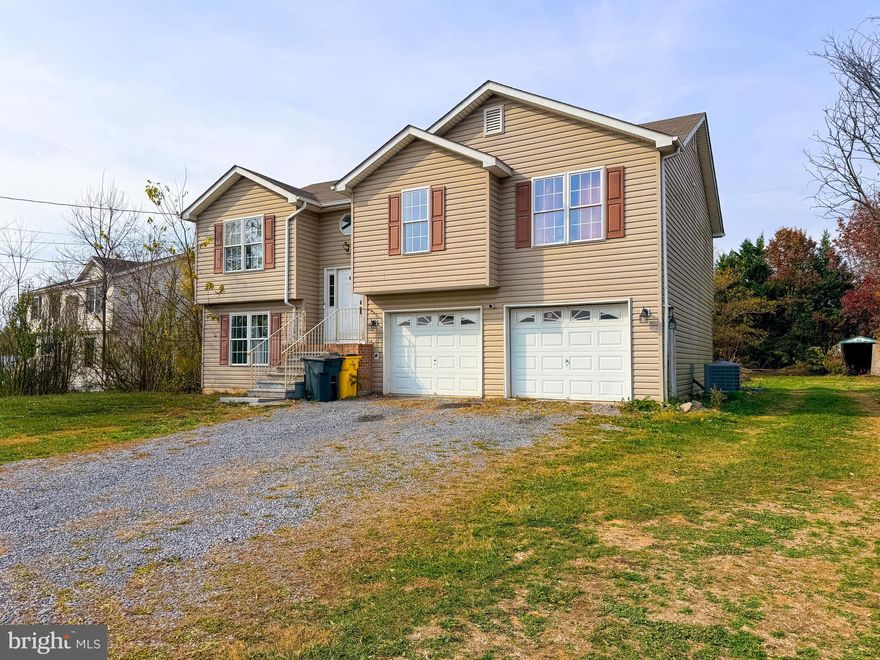 4 Bedroom, 2.5 bathroom home in a sought after subdivision in Bunker Hill.  The basement is partially finished off.  The bathroom is ready for the tub to make it a full bathroom.  The windows and cathedral ceiling make the rooms feel large and bright.  There is an extra large garage. not cleaned out yet, that has enough room for 2+ cars.  Definitely needs improvements and TLC to make this your home.