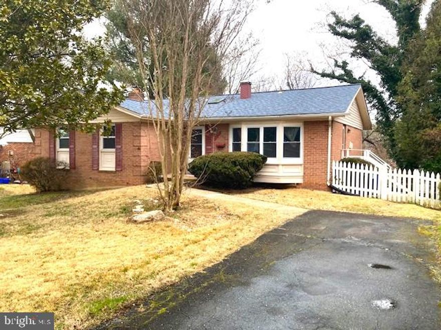 APPLICATIONS UNDER REVIEW. Spacious Beauty includes Hard Wood Floors throughout, Stone Foyer Entry, Granite Counters and  Stainless  Steel Appliances included the kitchen w/ Bay Window Front view.  Upper Lvl Bathrooms include all white marble style tile and stainless  steel fixtures.  The huge basement comes equipped with Wood Burning FP, Den, and In Law Suite w/ Wet Bar and half bath.  Just minutes away from Metro.  Must Have Strong Rental History Min Credit Score of 640.  Min Income Requirement of $89K Annually