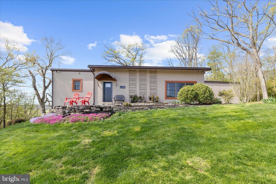 You will want to see this property its Gorgeous !!  Welcome to this extraordinary custom-built home nestled in the serene countryside of Baltimore County—where privacy, lifestyle, and convenience come together seamlessly. Offering 4 bedrooms, 2.5 bathrooms, and a thoughtfully designed layout, this home delivers both everyday comfort and exceptional entertaining.

Step inside to a true open-concept main level featuring soaring ceilings, transom windows, and rich oak hardwood flooring. Natural light pours into the living, dining, and kitchen spaces, creating a warm and inviting atmosphere. The kitchen is beautifully appointed with granite countertops, induction cooktop with exhaust hood, wall oven, tile flooring, and a spacious island with built-in microwave.

Designed for effortless one-level living, the main floor also includes a large home office with radiant heated floors, laundry room, and an expansive primary suite. The primary retreat offers dual walk-in closets and a spa-inspired bath, along with direct access to a stunning screened-in porch, french doors—perfect for enjoying peaceful countryside views.

The fully finished lower level expands your living space with three additional bedrooms, a full bath, a den with radiant flooring, and a large recreation area previously used as a basketball gym. This flexible space also includes a storage area with potential for garage conversion. French doors lead to a beautifully designed patio, creating seamless indoor-outdoor flow.

Outdoor living is where this home truly shines. Enjoy multiple spaces to relax and entertain—from the screened porch to the lower patio and firepit area. A private field just beyond the home offers endless possibilities for recreation, gatherings, or simply enjoying the surrounding nature. Extensive landscaping enhancements, stone walkways, flowering trees, and curated gardens elevate the property’s charm, while a fenced organic garden and fruit trees provide a true farm-to-table lifestyle.

The home is equipped with a highly efficient geothermal heating and cooling system, radiant heated floors, a mini-split system, advanced BAT septic system, and a whole-house Generac Home Generator for peace of mind.

Perfectly positioned, this property offers the tranquility of country living while remaining just 15–20 minutes to Hunt Valley and 25 minutes to Greenspring Station, with easy access to major routes including I-83, 695, and beyond.

Surrounded by protected countryside views, vibrant nature, and a welcoming community—including the charm of local horse and hound traditions—this one-of-a-kind home offers a lifestyle that is truly unmatched.