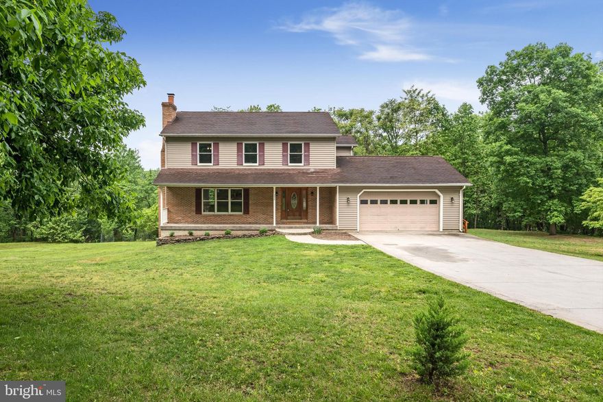 *Showings begin Friday, May 17* There's so much to love about this great home tucked away on over an acre of unrestricted land in a private Harpers Ferry community. Bring your animals and settle in to country living! Located just a few minutes from Rt. 9, commuting is a breeze from this ideally situated property abounding with fruit trees, wine berries, and wooded areas that provide peacefulness and seclusion. The walkout lower level was recently refinished with a spacious rec room area featuring LVP flooring and a built-in bar that's perfect for entertaining. An extra bedroom or office with barn door closet, full bath adorned with exceptional finishes, and extra storage space make this area all the more functional to meet your needs. The main floor has real hardwoods throughout the foyer, family room and dining room, a brick wood-burning fireplace, and a spacious mud room/laundry area conveniently located off the 2-car attached garage. The eat-in kitchen features ceramic tile floors, stainless steel appliances, and plenty of cabinets and counter space, plus a built-in pantry and island. Upstairs are 3 more well-sized bedrooms with new carpeting and 2 full baths with ceramic tile flooring. Enjoy the outdoors from the back deck, patio, or front porch - all of which allow you to enjoy the quiet surroundings of nature and the warm summer weather. Take a look and see if this amazing home is the right one for you!