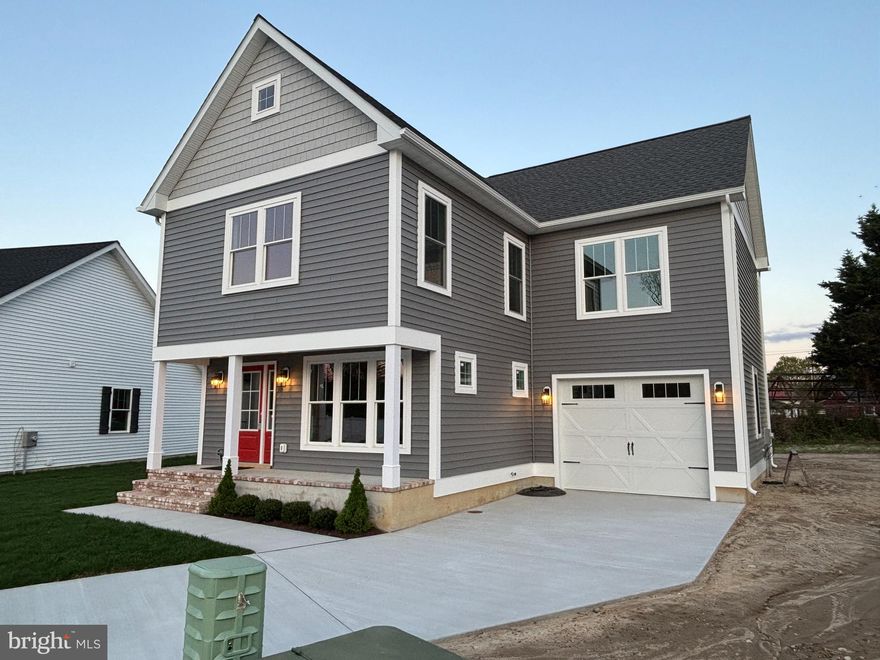 SIGNIFICANT PRICE ADJUSTMENT 7/10/25!  Come tour the first two story “Liam” model custom designed and stick built home at 16 Sandy Lane in downtown Easton.  This is the fourth of ten homes being built in the new Sandy Lane subdivision and one of only six lots still available in this fantastic new Easton neighborhood. This two-story home offers three bedrooms, two full and one-half baths, an open first floor plan with great room, beautiful kitchen with island open to a spacious dining area. The kitchen features "Presidential series" soft close cabinetry in Silver Strand finish, quartz or granite countertops, stainless steel appliances and a huge walk-in pantry.  On the second floor, through a private entrance, there is a true primary bedroom "suite" with huge walk-in closet (which in addition to closet space could accommodate a small office) and a luxurious private bath with a large walk-in tiled shower, double bowl vanity, and linen closet. There are two additional bedrooms and a generous hall bath as well as a dedicated laundry room.    There is a generous one car garage in addition to a concrete private driveway for parking. The exterior facade will be Mainstreet Certainteed lap siding in coordinated Charcoal and Sterling Gray with 50 year Architectural asphalt shingles on the roof.  The house will be surrounded by custom landscaping with a sodded front yard and includes a huge rear deck, perfect for relaxing and entertaining. ****** Sandy Lane homes are stick-built by local contractor Stansbury and Sons, individually designed by architect Darren Johnson, and are packed with high end features including 200 amp service,; encapsulated, climate-controlled crawl spaces (suitable for storage); superior framing and finish construction; certified IECC Energy Efficient insulation (R-49 ceiling, R-21 walls); high-quality luxury vinyl flooring; ample closet space; recessed lights throughout; and contemporary ceiling fans and fixtures. The flexible floor plan makes the Liam suitable for a wide range of homeowners.  All infrastructure costs (permits, site work, utilities, street improvements, etc.) have been prepaid by the developer, so there are no extended yearly front foot fees for the buyer. *** Sandy Lane is located off N Washington Street in Easton, offering convenient access to downtown amenities, including Easton Utilities (electric, water, sewer, cable, and high-speed internet) and weekly town trash and recycle pickup. You can also enjoy the many downtown parks, sports fields, trails, playgrounds, tennis and pickleball courts, a community pool, and a dog park. Easton also offers waterfront access, fire and police services, medical facilities, cultural attractions, shopping, and dining. New property assessment will be provided once construction is complete and occupancy permit issued. Sandy Lane is subject to Covenants and Restrictions but no HOA/HOA fees.  Developer: SANDY LANE, LLC.  MHBR 9512.  Builder: STANSBURY AND SONS HOME IMPROVEMENT INC., MHBR 8351.