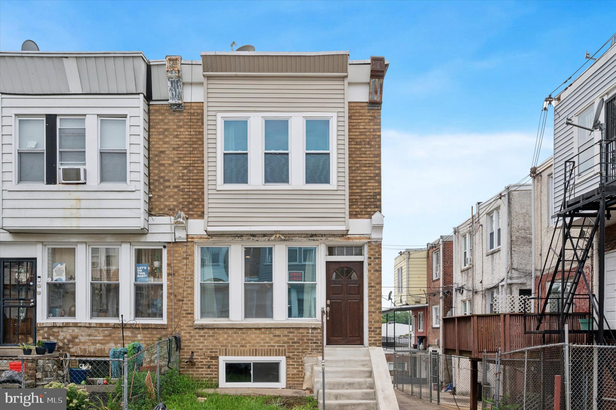 3136 N Spangler St offers a bright and thoughtfully updated 3-bedroom, 2.5-bath home in the West Allegheny section of Philadelphia. Renovated just a few years ago, the home features a sun-filled first floor with windows lining both the front and side walls, an airy, open layout that’s enhanced by its position as an end unit, giving you added privacy and natural light. The spacious living room welcomes you in with custom built-in open shelving, recessed lighting and nice LVP flooring. From there, the layout flows seamlessly into a cozy dining area and straight through to the kitchen. The kitchen stands out with quartz countertops, custom two-tone cabinetry, a tiered peninsula, a striking tile accent wall, pot filler, and stainless steel appliances. Completing the main level is a convenient powder room. Upstairs features a spacious primary suite with a private bathroom showcasing beautiful tile work, a stall shower, and a sleek vanity. The second bedroom connects to a full hall bathroom with a tub/shower combo, which also has separate access from the hallway. The third bedroom is nicely sized with tons of natural light. A laundry closet is conveniently tucked away for easy access without taking up extra space. The partially finished basement offers additional living or storage space, polished concrete floors, and direct access to a one-car garage plus an extra parking spot in the rear alley. This home is move-in ready! Schedule your appointment today.