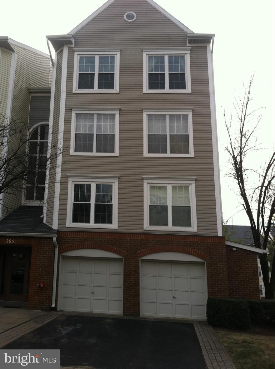 Beautiful first floor unit with fireplace and patio.  GREAT LOCATION, NEWER STOVE - BUILT-IN MICROWAVE- REFRIGERATOR WITH WATER & ICE IN DOOR - NEWER WATER HEATER, CARPET, PAINT WITH PRIVATE GARDEN.FIREPLACE IN LIVING ROOM