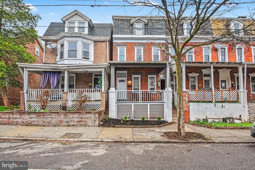 Welcome to 35 E 2nd St, a freshly painted 4-bedroom home offering bright interiors, modern updates, and a covered front porch. This home blends classic brick exterior charm with clean, refreshed finishes throughout.

Step inside to a light-filled main level featuring durable flooring, neutral tones, and recessed lighting, creating a warm and inviting atmosphere. The layout flows seamlessly into the updated kitchen, complete with white cabinetry, refreshed countertops, and modern fixtures that balance style and functionality. Fresh paint throughout enhances the move-in ready appeal and provides a crisp, cohesive look across the home.

Upstairs, you will find four bedrooms offering flexibility for a variety of needs, including guest space, a home office, or additional living areas.

The covered front porch extends your living space outdoors and offers a perfect spot to relax. Just steps from the municipal park, the location adds to the home’s appeal. The property also includes two off-street parking spaces in the rear, along with convenient on-street parking for added accessibility.

Whether you are an investor or an owner-occupant, 35 E 2nd St presents a great opportunity with space, updates, and move-in ready appeal.