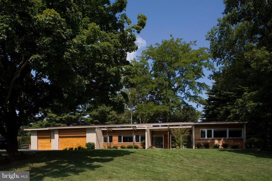 Stunning renovated & expanded mid-century modern classic. Design by Jay Jenkins and Dan Proctor/Kirk design w/ finest materials & finishes. Expansive master bedrm addition with his/hers closets, luxury bath, high ceilings. New kitchen w/carrera marble, professional appls. Finished LL with large FR, BR#4 and full bath. Entertainers delight with pool, stainless hot tub. Generator, Irrigation system.