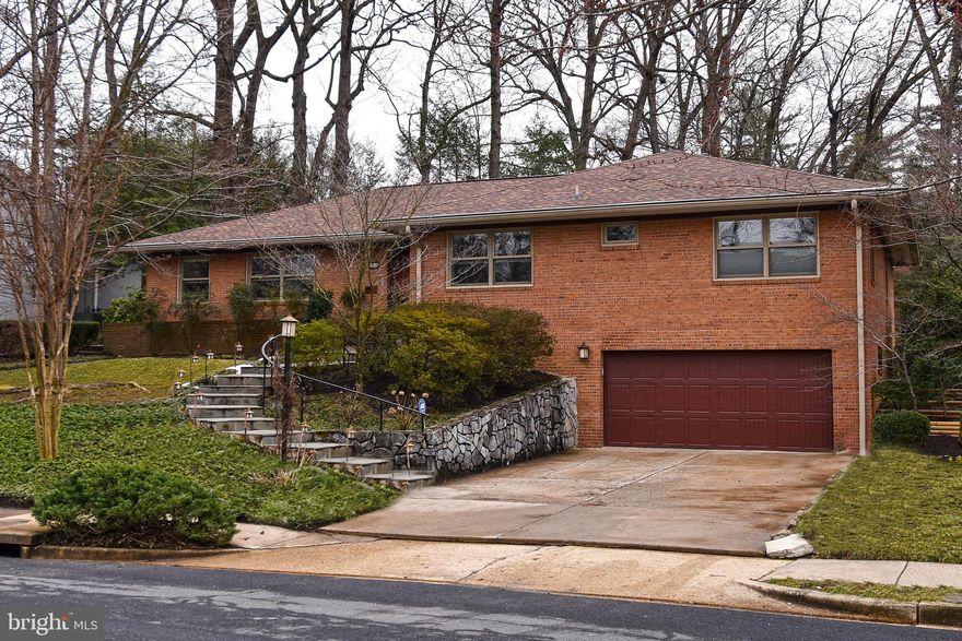 This one will knock your socks off!!Spacious rooms, lots of light, and updates galore. Imagine arriving at this custom built rambler with short walkway to the inviting front door. Open the door, and WOW! Tour the main level slowly to absorb all of the grand features beginning with the stunning newer chef s kitchen complete with silestone countertops, professional gas range with commercial hood, stainless steel appliances, and custom cabinetry.  Then ease into the adjoining captivating sun room with breakfast area, a built-in server with exhaust fan, vaulted ceiling with custom ceiling fan, Pella windows and gorgeous garden views. Continue your tour through the spacious living room with large picture window to garden and raised hearth fireplace. Then head into the adjoining family room ( music room) with a wine cooler. Arriving back at the slate floor entry foyer, you turn into the hallway, past the added powder room, to reach the three good-sized bedrooms. Each bedroom has a ceiling fan.  There is a renovated  Jack and Jill  full bath between bedrooms 2 and 3. The master bedroom has a renovated full bath with skylight, separate tub and shower. Each of these baths feature radiant heated floors. The entire first floor has exposed hard wood flooring.  The Pella windows throughout the first floor have shades built in.  There is a laundry room adjoining the kitchen which features the LG front load washer and dryer. And don t miss all of the custom wood closet doors and recessed lighting throughout. But wait, there is more. A full finished lower level awaits your inspection. Come down the stairway into the lower level family room with a fireplace and outside entrance. There is an office, a craft office with an adjoining tiled work room. There is another totally renovated full bath entered from the family room. The large two car garage is egressed through a family room door.  There is plenty of storage including the utility room that houses the newer 2-zone HVAC system.  And the list of features goes on