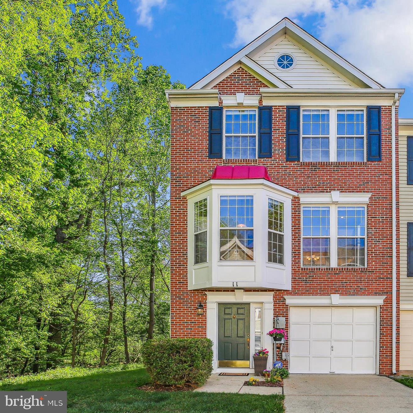 WOW! This stunning end-unit townhome feels like new with recent renovations and modern updates throughout. Featuring three finished levels and an attached garage, it is beautifully surrounded by trees with outdoor spaces accessible from both the lower and main levels.
The main level boasts high ceilings and abundant natural light from numerous windows and sliding doors leading to a private deck. The completely renovated kitchen features stainless steel appliances, 42-inch white cabinets, upgraded granite countertops, a pantry, and a wall of windows. It overlooks the dining room, perfect for easy entertaining. There is also a breakfast nook in the kitchen for informal dining.
The spacious family room offers a cozy gas fireplace flanked by two windows and direct access to the deck. Gorgeous hardwood floors span the main living area and both staircases. A convenient half bath completes this level.
Upstairs, new carpeting extends throughout the bedrooms. The primary bedroom includes two closets and a beautifully renovated en suite bathroom with modern updates. There are 2 additional bedrooms on this level and an updated hall bathroom.
The lower level, with direct garage access, features a den that opens to a private back area. This level also includes a hall closet, a half bath, and a full-sized washer and dryer.
Recessed lighting brightens all three levels, and a brand-new roof was installed in 2025.
Set against a backdrop of trees and common grounds, this gorgeous townhome offers a peaceful retreat within the Cloverleaf community. Lastly, enjoy easy access to I-270 and nearby shops and restaurants. You won't want to miss this townhome!