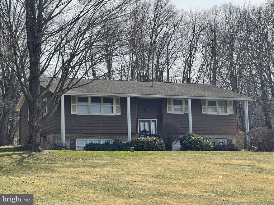 BiLevel refreshed and move in ready. 3 Bed, Full  Bath and large Eat In Kitchen. Large 1.8 acre lot offers privacy and beautiful views. Storage shed contains a riding mower included.