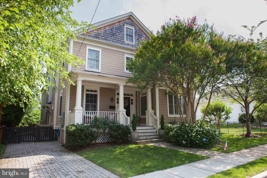 MASKS AND SOCIAL DISTANCING REQUIRED. With all the charm and convenience of Rosemont, this bright 6 bedroom, 4.5 bath house, has approximately 5500 sq. feet of elegance and style, for comfortable living. Enjoy sitting on the relaxing front porch for a chat with your friends or family. The entry is through a center foyer, opening into a study with built-in shelving on one side and an elegant dining room on the other. The spacious bright dining room, coffered ceiling, extensive moldings and wood floors, is ideal for entertaining a large crowd or a festive family affair. The heart of the house is a marvelous open white kitchen with a large island providing storage, a bar-sink and beautiful marble-like white quartz countertop, ideal for cooking or entertaining. The gourmet chef will enjoy the professional 4 burner gas Wolfe stove, a side-by-side Sub-zero refrigerator and freezer, under counter microwave, Bosch dishwasher and a large white farmhouse sink. An elegant marble backsplash compliments the tall white cabinets. For even more storage, between the kitchen and dining room is a butler's pantry and large walk-in pantry. The open plan kitchen is linked to a generous breakfast room and a large family room with wood burning fireplace, wood floors and French doors leading to a balcony overlooking the rear garden. There is also a side entrance on the main level with a half bath and useful mud room. The main level also has a side entrance to driveway, a half bath and handy mud room and coat closet  This quality house, built in 2012, is on 4 levels, linked by a unique, graceful open curved staircase with cozy landings large enough for a desk, Christmas tree or a quiet place to sit and read. The second level has a large master suite with dressing room, 2 large walk-in closets and a beautiful marble bath with double vanity, walk-in shower and free-standing claw soaking tub. Additionally, there are two other spacious bedrooms, a full bathroom and a well-positioned laundry room with washer and dryer, and storage cabinets on that floor. The top floor has hobby room, 2 bedrooms and one full bathroom. The larger bedroom has a walk-in closet and is currently used as an office.  The lower level is totally finished providing guest bedroom in-law suite, with a large walk-in closet and full bathroom. The basement also has an open recreation room and a second family room with gas fireplace.  The basement has new carpet throughout and has been freshly painted.  The fully fenced side back garden has grass for playing and a nice patio area for outside cooking and entertaining.  Only a few blocks to the Braddock metro, the restaurants and shops of both Old Town and Del Ray. Park your cars in your driveway and enjoy the lovely walkable lifestyle this home has to offer.