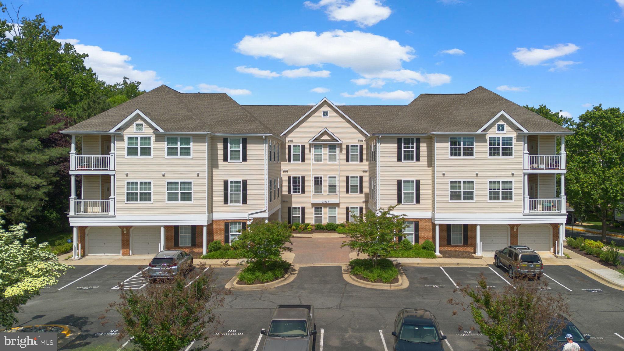 This light-filled 2-bedroom, 2-bathroom condo is located on the top floor, offering vaulted ceilings and great natural light throughout. The living and dining areas feature an open layout with a gas fireplace and access to a large covered balcony—perfect for relaxing or enjoying a quiet moment outdoors. The kitchen includes quartz countertops, stainless steel appliances, and plenty of cabinet space. The primary bedroom offers an en-suite bath and generous closet space, while the second bedroom and full hall bathroom provide flexibility for guests or a home office. Additional highlights include in-unit laundry and convenient access to nearby shops, including Wegmans, Milestone & Neelsville shopping centers, restaurants, and major commuter routes. A comfortable, move-in-ready space in a great location.