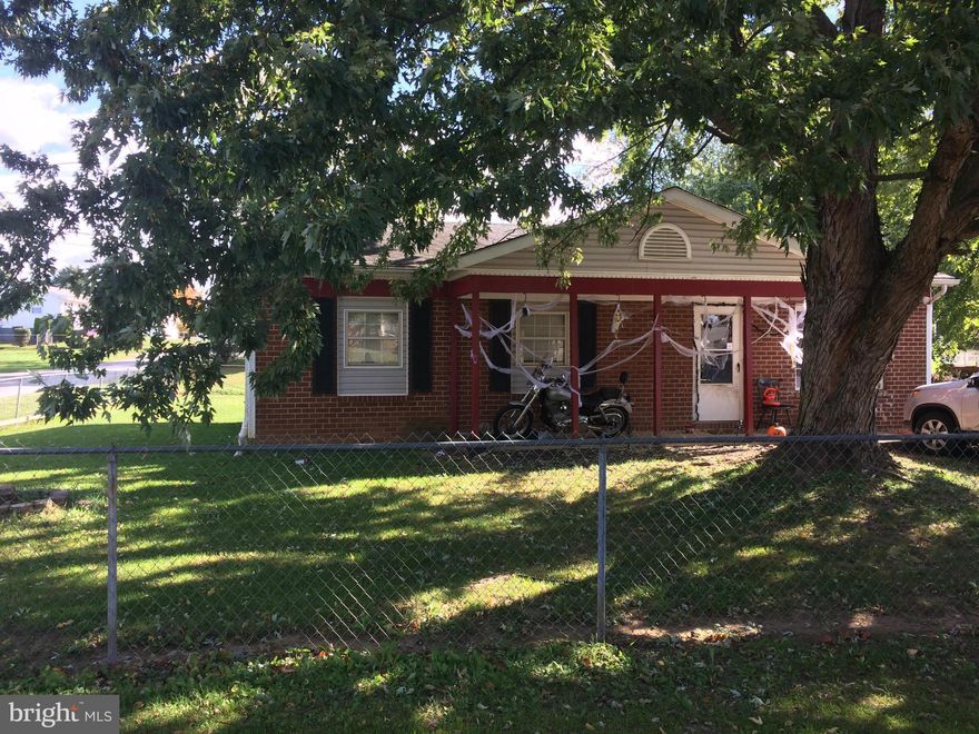 Ranch style home offering 3 beds, 1.5 baths.  Located on a corner lot with fenced  yard.  Property needs some TLC , being sold in as-is condition.