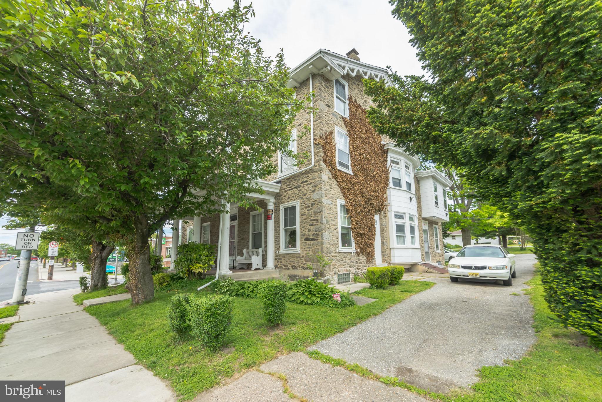 Large price reduction!! 28,000 sq. ft. property for sale, owned by the same family for generations. This 4 unit building has unique characteristics throughout. The first floor is a three bedroom unit with large living /dining room area with fireplace, also has kitchen and full bathroom. The second floor has ( 2) one bedroom units each with nice sized living rooms , kitchens and full baths. The third floor is a two bedroom unit also with large living room, kitchen and full bathroom. There is a detached garage and plenty of land in addition to the 4 unit building. This property, building and land, has great potential to be developed either as commercial or residential. The location is very desirable. Close to public transportation, Wissahickon park, center city and major highways.