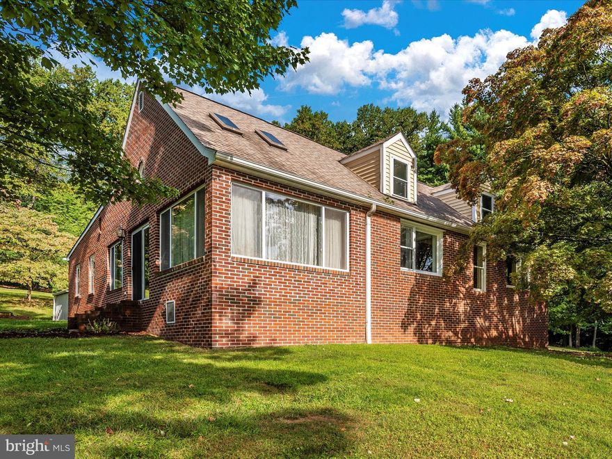 Brick Home on 3.44 wooded acres in the country but still close to Historic  Frederick City and all conveniences and attractions that Frederick has to offer. Close to commuter routes to both Washington DC and Baltimore. Close to Ft. Detrick and access to Medical Offices and shopping. 3 buildings on property including large workshop and 2 storage sheds. Roof replaced in 2016.  Property is being sold "As-Is".