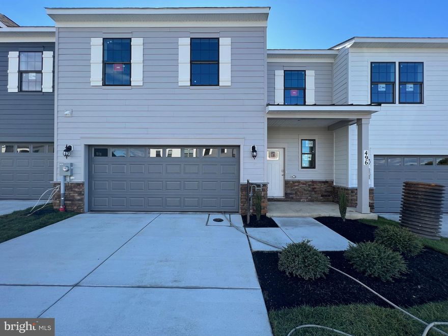 Brand new Never lived in,Excellent 2 level Villa in Renn Quarter community with 3 bedrooms,3.5 baths, & 2-car garage,2500 sq feet of living space! Kitchen and all bathrooms includes quartz counters, white maple cabinetry,Gourment Kitchen & stainless steel appliances.Hardwood floors on entire main living level.Large master Bedroom with Luxury bath features dual vanities,quartz Counters and large walk-in shower.Convenient laundry on bedroom level.Enjoy beautiful common area in the rear, as well as a deck off the living room. Amenities include pool, clubhouse with fitness center, and walking trails. Show & Rent today.