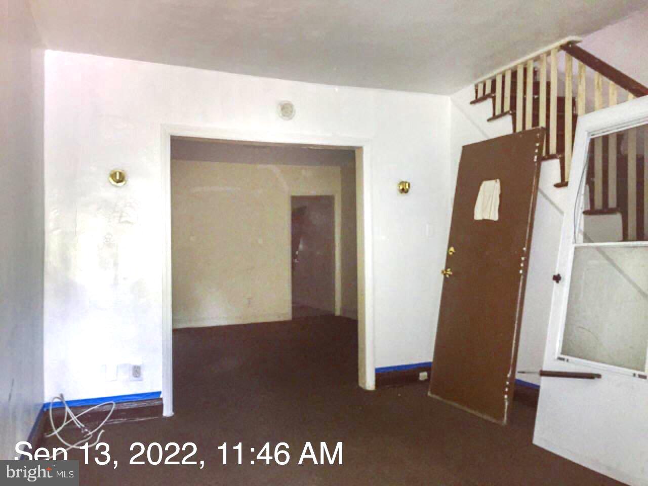 RENOVATION OPPORTUNITY WITH THE POTENTIAL FOR 3 FINISHED LEVELS AND OFF STREET PARKING! Main level with a spacious living room, separate dining room, and kitchen, upper level with 3 true bedrooms and 1 full bath, a full basement that can be finished to add more living space, and a large fenced yard with a parking pad. Rear yard backs to green space for extra privacy. Ideal location - within 1 mile of both Johns Hopkins University and Morgan State University. Sold As-Is! Seller will make no repairs. CASH OR HARD MONEY ONLY!