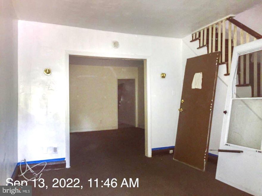 RENOVATION OPPORTUNITY WITH THE POTENTIAL FOR 3 FINISHED LEVELS AND OFF STREET PARKING!  Main level with a spacious living room, separate dining room, and kitchen, upper level with 3 true bedrooms and 1 full bath, a full basement that can be finished to add more living space, and a large fenced yard with a parking pad.  Rear yard backs to green space for extra privacy.  Ideal location - within 1 mile of both Johns Hopkins University and Morgan State University.  Sold As-Is!  Seller will make no repairs.  CASH OR HARD MONEY ONLY!