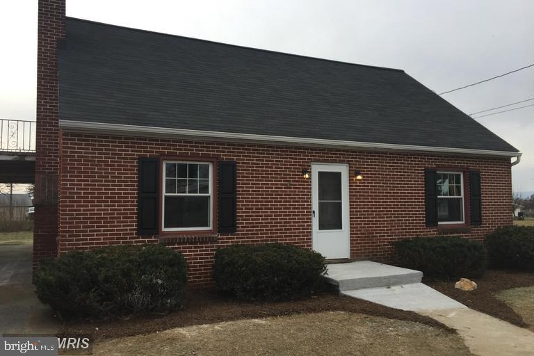 Fabulous Newly remodeled Brick Cape Cod in Chambersburg close to I 81 and all amenities. Exquisitely designed kitchen with Granite counters, stainless steel appliances, custom lighting and beautiful wood laminate flooring. Keep nice and warm next to your Wood burning fireplace on those cold winter nights. Master suite on the upper level with custom tile shower and double sink. Dual zoned with new heat pumps.