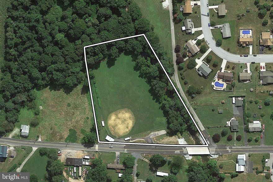 Industrial Zoning   3.48 level acres near Arendtsville.  Upper Adams School District.   
Once a popular baseball field,  this parcel offers chain link fencing,  access to Conewago Creek, and great highway exposure.   Owner also may consider leasing.