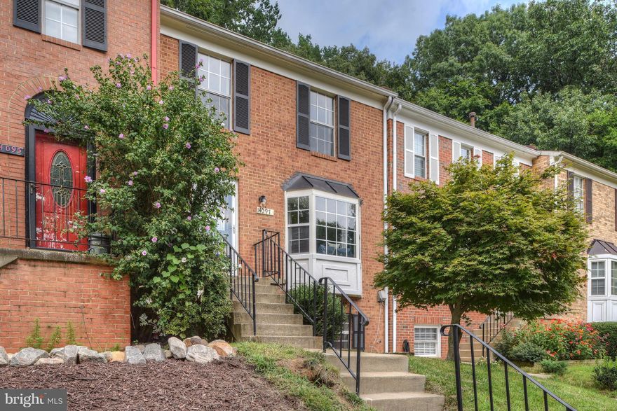 Brickfront Townhome with Three Finished Levels, 3 Bedrooms, 3 1/2 Baths! Fully renovated less than two years ago! Kitchen w/ SS Appliances, Tile Floors/Backsplash, Expresso Cabinets, Granite, New Baths, Master w/ White Carera and Glass Listello, Recessed Lighting in Family Room and all Bedrooms, New Plumbing, Electric, Fixtures, Hardwoods,Fully Fenced and Deck in Backyard, Home Backs to Trees!