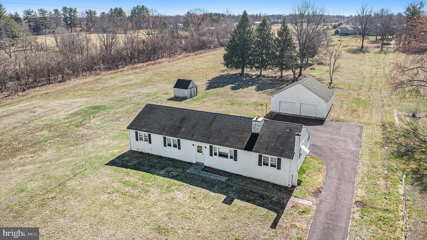 Don't miss this rare opportunity to own  a ranch home on over 3 ACRES in the desirable Towamencin township within the North Penn District!  Conveniently located, with easy access to  Skippack Village, Fischer's Park and the turnpike.  As you step inside, you are welcomed by a cozy family room with a wood-burning fireplace taking center stage framed by custom built-in bookshelves waiting for your personal touches.  Adjacent to the family room is the dining area, perfectly situated next to the kitchen creating a natural flow  between both gathering spaces.  The kitchen overlooks the  expansive rear yard and opens to a large family bonus room.   The additional family bonus room features a wood-burning stove, perfect for keeping warm on those chilly nights.  From the bonus room step into the sunporch which provides easy access to the backyard and detached 2-car garage. The sunporch is a great space to start the outdoor activities-let the fun begin!   This room allows easy access to the rear yard and the free-standing two-car garage.  There are three nice sized bedrooms and one full bathroom on the left side of the house.  All the rooms have lots of natural light and hardwood floors.  The basement, though unfinished, offers endless potential for storage, a workshop, or a craft room.  If you've been dreaming of owning land with room to grow, this is your chance. The property extends well beyond the garage, providing ample space for outdoor activities, gardening or simply enjoying the serene surroundings. Schedule your appointment today and explore the possibilities this property has to offer.  Offers due Monday, 3/23, by 3pm!