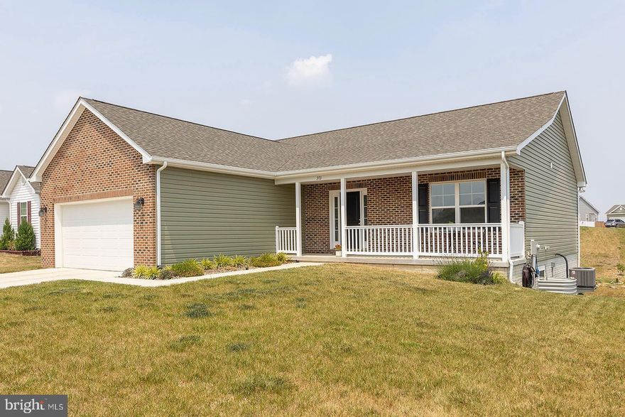 This gorgeous ranch is definitely better than new!! Your showing will be nothing short of amazing from the lovely new deck/patio  and upgraded front of the home to the open floor plan,  featured when you walk through the door. This buyer chose to upgrade to natural gas heat, hot water, and fireplace.This is an option that is offered in the sub-division and indeed is rare in the Martinsburg area!! There  is also additional brick work, and an added pantry along with a gas range in the kitchen,  which are both upgrades.  The deck and patio area were just recently added  and really pick up the rear of the home.  So many wonderful things offered by this home, all with one level living!!  Of course you have the option of finishing the basement for additional space as needed.  Please don't let this outstanding home pass you by!!!