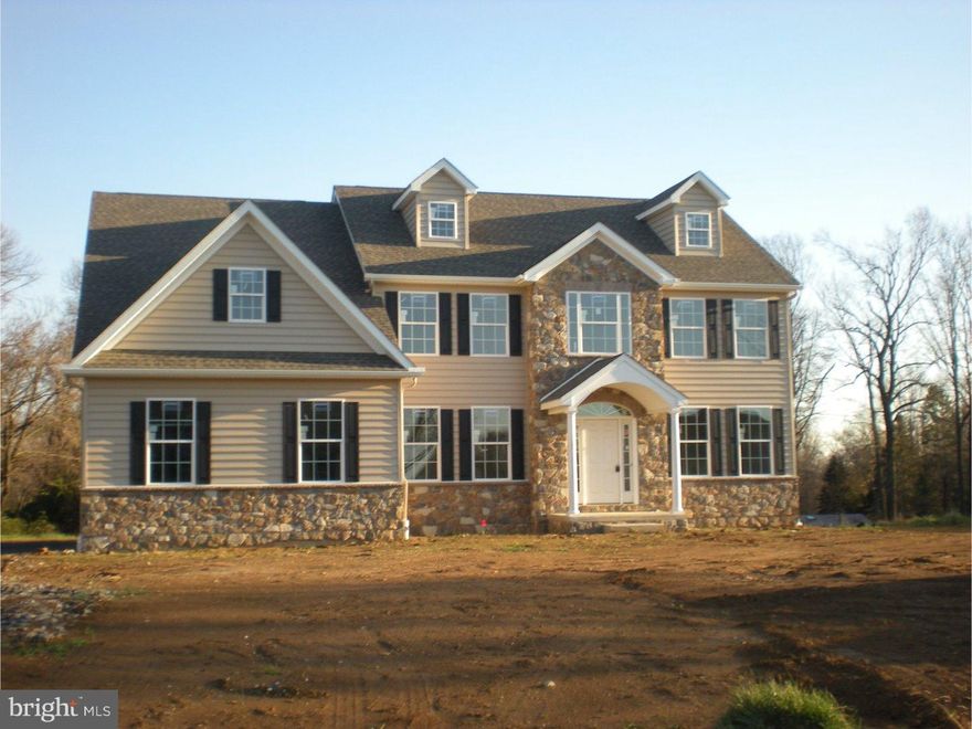 Immediate Delivery on this brand new spec home on perfectly level 1 acre home site on cul-de-sac street in Glen Mills. Classic 2 story colonial with stone front and vinyl siding and NO STUCCO. Covered front entry way. Hardwood floors through out first floor. Oversized baseboard and casing.  2 story entrance foyer with oak "T" stair front and back. Open living room. Formal Dining Room with chair rail and crown molding. First floor study. Powder Room. Family Room with cathedral ceiling and gas fireplace with stone surround and mantle. Fabulous kitchen with white shaker style cabinetry and center island. Soft close drawers. Granite tops. Stainless steel appliances including 5 burner gas stove, space saver microwave, dishwasher and refrigerator. Large pantry cabinet. Breakfast area with SGD to back yard. Coat closet off garage. Large laundry room with wash tub and OE to rear yard. Upstairs MBR with tray ceiling, ceiling fan and recessed lights. 2-walk in closets. Sitting room with vaulted ceiling. Master bath with custom tile shower. Soaking tub with tile surround and double bowl vanity. Secondary bedrooms share a tiled hall bath with double bowl vanity. 9' ceilings on the first floor. 9' basement walls with bilco door outside entrance-Ready to be finished.