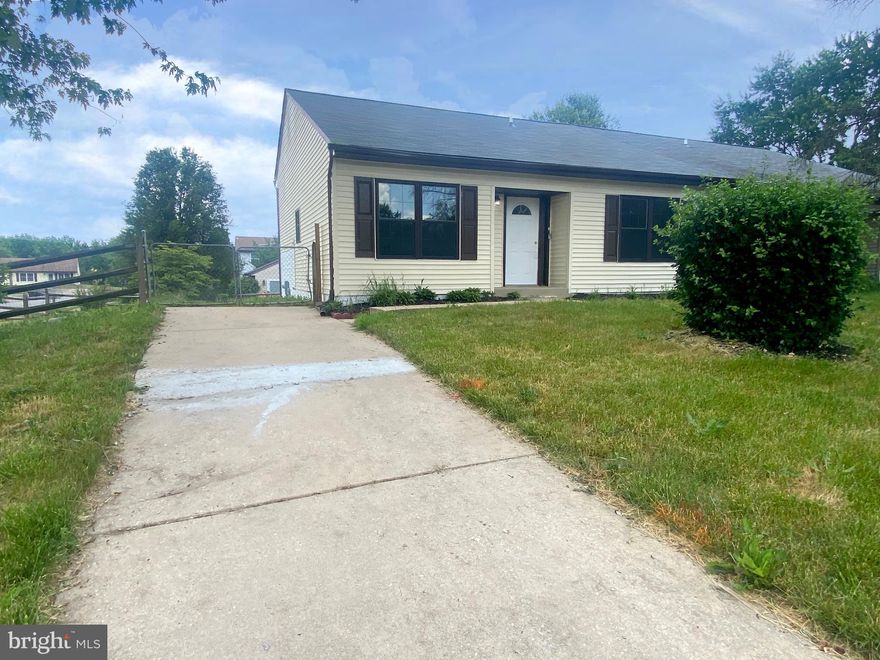 This home is a duplex with a large side yard. The main level has a cathedral ceiling in the living room, a formal dining room and kitchen. The upstairs features three bedrooms and a full bathroom. The lower level has a finished rec room with a half bathroom. The rec room walks out to the fenced back yard. Finishing off the lower level is a utility room for laundry and a workshop/ storage area.