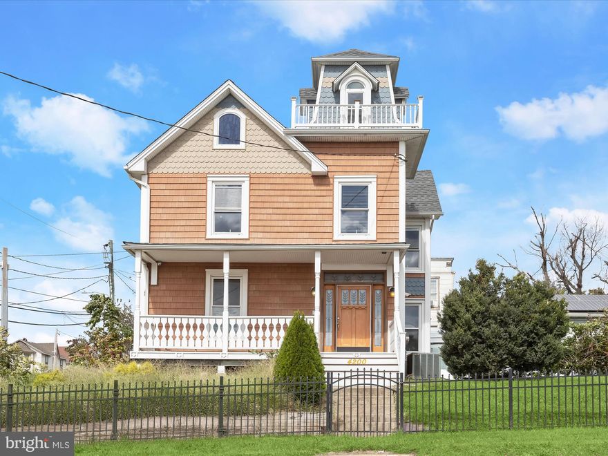 > IMMEDIATE AVAILABILITY <This Stunning Victorian Gem Offers Over 2,000 Sq Ft Of Living Space And Includes A Rear Lot That Conveys With The Sale, Providing Expanded Outdoor Possibilities And Added Value. Lovingly Updated To Honor Its History While Embracing Modern Living, The Home Welcomes You With A Captivating Façade Featuring A Covered Front Porch, Cedar Impressions Siding With Fish Scale Detailing, And The Original Widow’s Walk Offering Sweeping City Views. Inside, The Main Hall Foyer Showcases Etched Glass Accents & Rich Hardwood Floors Leading To A Living Room Adorned With Custom Millwork. The Library Features Custom Built-In Shelving, Wall Sconces and A Sunlit Bay Window That Evokes Early 20th-Century Charm. The Dining Room, Framed By A Ceiling Medallion & Chandelier, Sets The Stage For Both Casual Meals And Festive Gatherings. The Gourmet Kitchen Boasts Granite Countertops, Handcrafted Cabinetry, Stainless Steel Appliances, A Double Wall Oven, Gas Cooktop With Downdraft Hood, And A Tin Ceiling Illuminated By Recessed Lighting. A Spacious Pantry And Main-Level Powder Room Complete The Main Floor. Upstairs, The Primary Bedroom Impresses With a Cathedral Ceiling And Custom Walk-In Closet. Three Additional Bedrooms—Including One Currently Used As A Laundry Room—Share A Beautifully Renovated Bath With Double Vanity And Frameless Glass Shower. The Uppermost Level Features The Historic Widow’s Walk, While The Basement Offers Ample Storage. Outside, Enjoy A Composite Patio With Hot/Cold Water Hookup, A Powered Workshop Shed & a Detached Garage. This Home Is A Rare Opportunity To Own A Piece Of Baltimore History In The Orangeville Neighborhood. Easy Access Out to All Major Routes Including I 95.