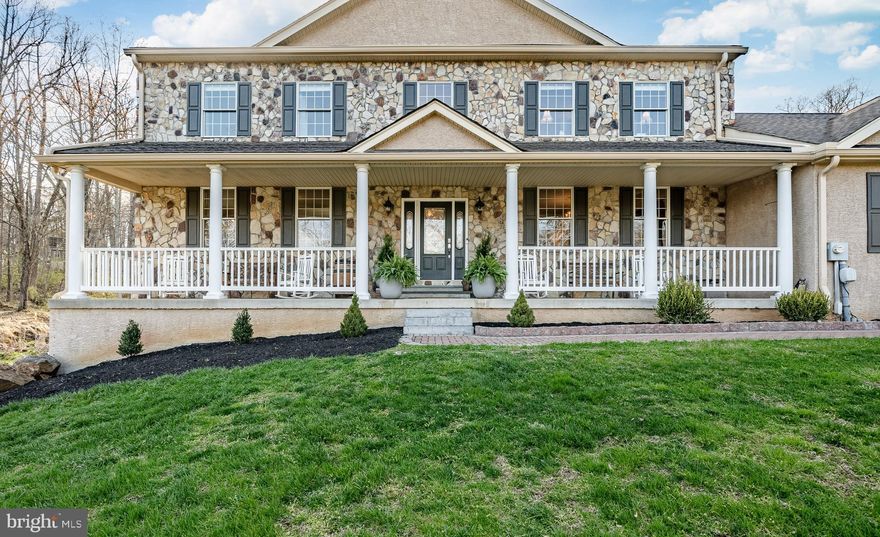 This is where privacy, space, and exceptional design come together in this stunning 5-bedroom, 4.5-bath custom home set on over 3 wooded acres. Offering more than 4,400 square feet of living space, this property is a rare blend of refined interiors and resort-style outdoor living. 
From the moment you arrive, the home’s elevated setting and serene surroundings create a sense of retreat. A dramatic, wide open foyer welcomes you inside, flanked by an oversized private office and formal dining room—perfectly suited for both everyday living and elegant entertaining.
At the heart of the home, a beautifully designed kitchen with pantry flows seamlessly into the expansive family room, highlighted by a cozy fireplace and walls of windows that bring the outdoors in. From here, step through double doors to experience the true highlight of this property…
 An Outdoor Oasis Designed for Living,
Extensive hardscaping transforms the backyard into a private sanctuary, featuring:

Multiple patio areas
Covered outdoor living space
Dedicated bonfire area
Peaceful wooded views in every direction,
Whether hosting gatherings or enjoying quiet evenings, this space was designed to be experienced year-round.

Upstairs, generously sized bedrooms provide comfort and flexibility, while the luxurious primary suite offers a true escape. A third-floor walk-up attic presents incredible potential for future living space, ideal for a home gym, studio, or guest retreat.

The fully finished walkout basement adds yet another layer of versatility, with ample storage and space perfect for a future wine cellar, media room, or entertaining lounge.

Car enthusiasts and hobbyists will appreciate the rare combination of a 3-car attached garage PLUS an additional 2-car detached garage, offering endless possibilities for storage, workshop space, or collections.

 With an open floor plan, and thoughtful upgrades throughout, this home offers both luxury and functionality in a setting that feels worlds away yet remains conveniently located.

 If you’ve been searching for space, privacy, and a lifestyle centered around indoor-outdoor living… this is it.