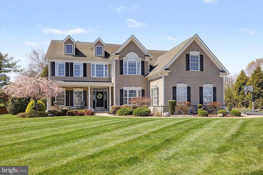 Welcome to this beautifully appointed four-bedroom, 3.5 bath, two-story colonial in the highly sought-after Ridings of Warwick within the Central Bucks School District. A grand foyer with hardwood floors greet you, along with elegant trim work and rich moldings that elevate the home’s style, all complemented by a neutral palette ready to suit any design aesthetic.
To the right of the entry is a private study that offers the perfect work-from-home retreat with views of the lovely landscape. Looking to the .left when you enter the home, a sun-filled living room flows seamlessly into the dining room and into the kitchen—the true epicenter of the home, creating an effortless layout for everyday living and entertaining. Gas stovetop cooking ( with a downward draft), double ovens, and plenty of counter space.. The owners thoughtfully opened the wall between the dining room and kitchen offering flexibility between living spaces. 
The great room is the heart of the home, featuring a soaring vaulted ceiling with architectural beam-style trim and a stunning wall of windows that fills the space with natural light. Whether it’s cozy nights by the gas fireplace or gathering with friends and family, this room delivers unforgettable moments.
The finished basement is an entertainer’s dream, offering almost 1,000 square feet of additional living space complete with a personal (heated) gym, bar area, full-bath, and custom  Bilco doors that bring in natural light, transforming the lower level into a bright, inviting extension of the home.
Upstairs, you’ll find four bedrooms, including a spacious owner’s suite with a versatile sitting area—ideal for relaxing, working, or creating a personal fitness space. The en-suite bath features a soaking tub, glass-enclosed shower, and expansive ceramic tile. Three additional bedrooms share a well-appointed full bath.
Outdoor living is just as impressive, with a beautiful teak deck and custom pergola that steps down to a paver patio with a built-in fire pit—perfect for entertaining on cooler evenings.
Set against the picturesque backdrop of Bucks County, the rear of the home overlooks a generational farm, where chickens and goats can sometimes be seen, orchard trees are beginning to grow, and a stone farmhouse reflects the timeless character of the land. This is a home where comfort, design, and location come together.
Close proximity to restaurants, shops, brewery with local events and stunning views.
Easy access to all travel routes.