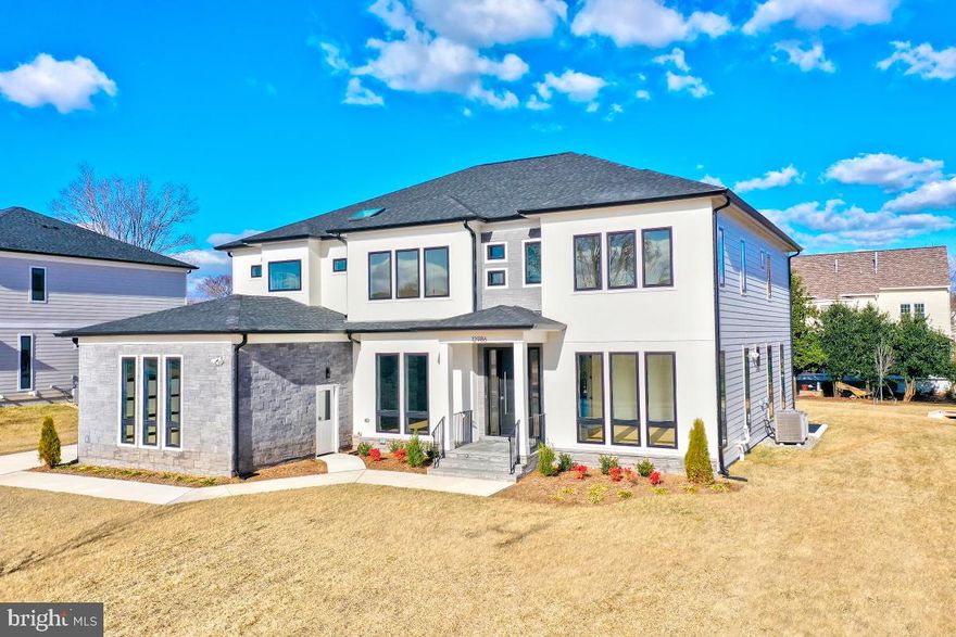 California-style modern 6,800+ sq ft home in this stunning 7-bedroom 7 bath home located on a quiet cul-de-sac street in newly-built Prince Towne community located off West Ox Road and Fairfax County Parkway. This home is built in Dec 2024, on a flat 0.38-acre lot and comes with 3 car garage, 2 EV chargers and epoxy flooring. Main level features impressive hardwood floors, a cozy fireplace, home office, in-law suite and meditation/prayer room. Multi-stacking door leads from family room to an expansive deck. Kitchen highlights professional-grade Thermador appliances, premium glossy cabinets, under-cabinet LED lights, quartz countertops and backsplash and exhaust-out vent. Second level with five bedrooms, each with its own bathroom. Fully finished basement with rec room, gym, media room, game room and a wet bar. Perfect blend of luxury and functionality. Commuter-friendly location (minutes to Herndon Metro) and <5 miles to Dulles Airport. Schools pyramid: Crossfield (AP: Navy), Carson MS and Oakton HS