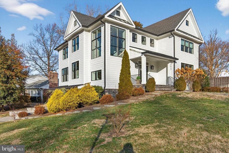 Perfectly positioned on a quiet and highly coveted cul-de-sac in Arlington’s desirable Crescent Hills neighborhood, this extraordinary six-bedroom, six-and-a-half-bath custom Craftsman home is a rare offering that must be seen to be fully appreciated. Thoughtfully designed and impeccably built with no expense spared, the home showcases an open-concept floor plan, nine-foot ceilings on the main level, gorgeous wide-plank oak hardwood floors throughout the main and upper levels, and an abundance of natural light. Quality craftsmanship is evident in every detail, including solid-core doors, designer fixtures, recessed LED lighting, in-wall speakers in multiple rooms, Cat 6 wiring, soundproofed floor systems, and high-efficiency mechanicals designed for comfort and longevity.

The main level is both elegant and inviting, beginning with a spacious foyer that opens seamlessly to formal and casual living spaces. The living room is anchored by a striking floating gas fireplace with customizable flame colors and is framed by a wall of windows and French doors that lead to the expansive patio, creating an effortless indoor-outdoor flow. The dining room is generously sized and bathed in sunlight, making it ideal for hosting memorable gatherings. The stunning chef’s kitchen is the true centerpiece of the home, featuring two-tone shaker cabinetry, quartz countertops, a marble tile backsplash, a six-burner gas range, stainless steel appliances, and an oversized island with seating for up to six, a second dishwasher, a second sink, a second dedicated cabinet for trash and recycling, and a built-in microwave. A beautifully appointed butler’s pantry with wine refrigerator and an enormous walk-in pantry add both function and flair, while the adjacent breakfast area overlooks the tranquil backyard. A versatile sitting room, a half bathroom, and a highly desirable main-level bedroom or office complete this floor.

The upper level offers a luxurious primary suite designed as a private retreat, complete with tray ceiling, built-in speakers, a cozy sitting area, two expansive walk-in closets with custom Elfa systems, and a spa-inspired bathroom featuring a soaking tub, multi-head shower, double vanity, and hot water recirculation for near-instant comfort. Three additional bedrooms on this level are spacious and sun-filled, each with custom Elfa closets and its own en suite bathroom. A dedicated upper-level laundry room adds exceptional everyday convenience.

The lower level is ideal for entertaining and extended living, offering a large recreation room prewired for a projector, built-in speakers, cork-backed LVP flooring, and a charming wood stove. An additional bedroom and two full bathrooms provide flexible options for guests, au pair living, or multigenerational needs. A custom mudroom connects directly to the oversized two-car garage with epoxy flooring and extensive storage solutions.

Set on a rare 0.28-acre flat, fully fenced lot, the backyard is truly a showstopper, featuring an expansive patio with gas line, a hot tub, irrigation system, basketball hoop, and a custom-built shed designed to match the home. Walking distance to the elementary (Discovery), middle (Williamsburg), and high (Yorktown) schools. Ideally located near parks, shopping, dining, and an easy commute to Tysons and Washington, DC, this exceptional residence offers the perfect blend of luxury, space, and location.