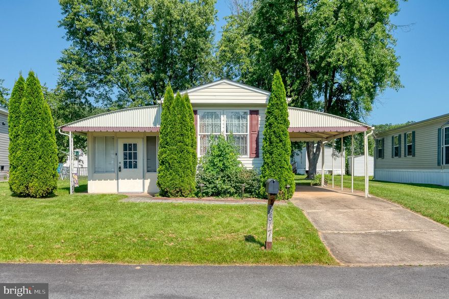 Beautifully Home with Modern Comforts & Exceptional Outdoor Living. Welcome to this charming and move-in-ready 2-bedroom, 2-bath home that blends style, comfort, and convenience. Featuring tasteful updates throughout, this home offers everything you need for modern living. Enjoy year-round relaxation in the enclosed sunroom—perfect for savoring your morning coffee or winding down in the evening. Step outside to two fantastic outdoor spaces: a covered side patio and a spacious open back patio, ideal for entertaining guests or enjoying peaceful moments outdoors. Recent upgrades include a new roof, new air conditioning, and a home warranty for added peace of mind. A storage shed provides convenient extra space for tools, equipment, or seasonal items. Located in a vibrant, amenity-rich community, residents enjoy access to: A community center with on-site maintenance, Fitness center, Two playgrounds, A dog park, Monthly resident activities,  A secured storage lot and more.  Conveniently situated near Route 43, I-95, and I-695, offering easy access to shopping, dining, and major commuter routes. Please Note: Park approval is required for all buyers. Don’t miss this opportunity to live in a beautiful home within a thriving, well-maintained community.  Check out the 360 virtual tour!