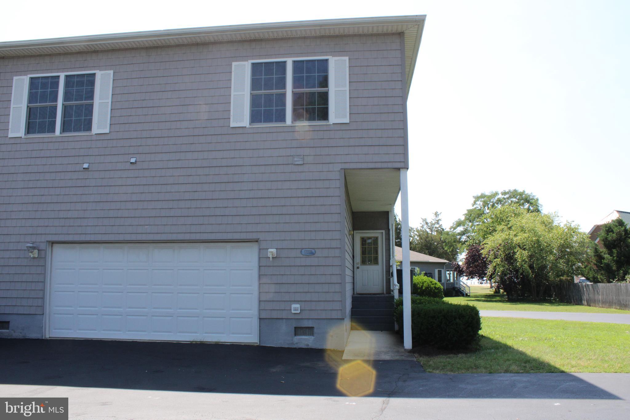 "PRICE INPROVEMENT"
Well lived in Town Home in Potomac Beach subdivision. This TH has main level and upper-level screened porches, 3 bedrooms, separate dining, living room, and huge two car garage. Originally built as a 4 bedroom/3 bathroom home; owner converted one of lower bedrooms into an office with wet bar area. Washer and dryer conveys. Amenities include onsite trash disposal, snow removal, lawn maintenance, access to private beach, community pier, and pier maintenance. Community pier accommodates boat, jet skis, and kayaks. Selling AS-IS with 4,000 dollar carpet/repair allowance. This property has partial water view from both screened rooms. This is a great property for anyone looking for beach and water access.
AS-IS LISTING. Town home in average condition. Mostly cosmetic fixes and some minor repairs are needed to make this a gorgeous TH perfect.