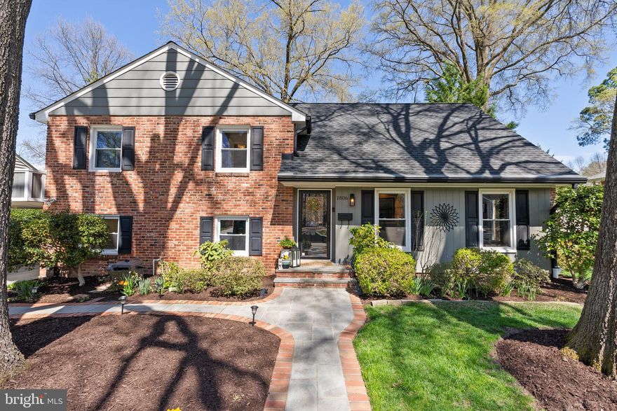 Welcome to 1806 Stirrup Lane, an exceptional home in the coveted Riverside Gardens Community. This stately residence is perfectly situated on a beautifully landscaped and hardscaped level lot in the heart of the tranquil Fort Hunt community. Every inch of this home has been thoughtfully updated to provide modern convenience and timeless elegance.
This spacious four-level home boasts four generously sized bedrooms and 2.5 beautifully updated baths, including a gracious owner’s suite with a stunning renovated en-suite bathroom. Gleaming hardwood floors adorn the main living and bedroom levels, while updated light fixtures, recessed lighting, and fresh paint enhance the home’s inviting ambiance.
Enter through two majestic oak trees and a custom brick and flagstone walkway to discover the main living level. A striking living room with expansive windows, a formal dining room, and a newly renovated eat-in kitchen create an ideal blend of classic charm and contemporary style. The gorgeous kitchen features stainless steel appliances, granite countertops, a pantry, breakfast bar seating framed by a large window overlooking the beautiful backyard. From here, step outside to enjoy a brand-new backyard screened-in porch and a large, updated trek deck—perfect for relaxing or entertaining.
Down one level, a spacious family room showcases a wall of exposed brick, custom built-in cabinetry, and a gas fireplace. This level also includes a convenient powder room, a large utility room with a new washer and dryer, new hot water heater, and an air-scrubbing system, plus a storage pantry beneath the stairs. A covered oversized carport (accommodating two cars) offers easy access to this level.
The third level highlights three large bedrooms with hardwood floors and an updated full hall bathroom. Ascend to the fourth level to discover the sunny owner’s suite, complete with a luxurious renovated en-suite bath and an abundance of closet and storage space.
Step outside to the professionally landscaped backyard, which includes an irrigation system, full fencing, and an expansive deck and screened-in porch for outdoor enjoyment. The newly installed roof adds to this home’s many recent upgrades. All new systems ensure efficiency and peace of mind for years to come. 
Ideally located just minutes from Mount Vernon, the Potomac River, Fort Hunt Park, and top-rated schools (Stratford Landing Elementary and Carl Sandburg Middle), this home also offers easy access to the Huntington Metro Station, Old Town, Fort Belvoir, Reagan National Airport, the Beltway, and the Pentagon. Enjoy a scenic commute along the majestic Potomac River by car, bike, or the 11Y Express bus.
Fort Hunt is a close-knit community and one of Fairfax County’s best-kept secrets. It offers the charm of small-town living with convenient access to everything the D.C. metro area has to offer.
There is truly nothing to do but move in and start living your best life in the amazing community of Fort Hunt!
Welcome home!
