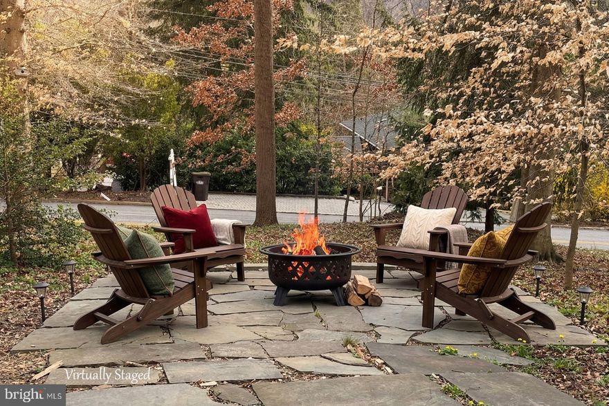 Make your appointment today!  Set on over an acre of tranquil, wooded land, this split-level home in Gulph Mills Village presents a compelling blend of traditional architecture and practical design, thoughtfully updated for contemporary living. The exterior, a classic combination of white siding with brick accents, is framed by mature trees, creating a private and established setting. The attached car garage and asphalt driveway offer convenient access, while the natural landscaping and sloping front yard contribute to the property's rustic appeal.
Inside, the home's five levels are designed to maximize both light and space. The living room, a central gathering point, features a striking wood-burning brick fireplace and a large picture window that frames scenic views, flooding the space with natural light. A spacious living room with a distinctive wood panel accent wall, complemented by recessed lighting and a ceiling fan. Throughout the main living areas, light hardwood flooring and white walls create a bright and airy ambiance.
The kitchen, while functional, provides an opportunity for future personalization. The hall bathroom has convenient access to the bedrooms, the downstairs powder room is convenient for guests, and the primary bath offers a private retreat with a shower stall. The lower level introduces a comfortable den and a laundry area with outdoor access, enhancing the home's practical flow.
With four bedrooms, including hardwood floors and a flexible space currently configured as a home theatre, this residence adapts to various lifestyle needs. The property's outdoor space, accessible from the dining area, includes a flagstone patio with a stone retaining wall, ideal for alfresco dining amidst the peaceful surroundings. Did you want to keep CHICKENS?  Perfect spot is located out of the way. The ELECTRIC fence is installed for ease of mind.
Positioned within the award-winning Upper Merion Area School District and offering quick access to major transportation routes, this home provides a balance of secluded living and urban convenience. At 121% of the city median price and significantly larger than the average King of Prussia home, this property offers substantial square footage and land, presenting a value proposition for those seeking more space and a private setting within a well-connected community. The distinct character of its split-level design, combined with its generous lot and established landscaping, offers a unique opportunity to own a property that feels both expansive and intimately connected to its natural surroundings.