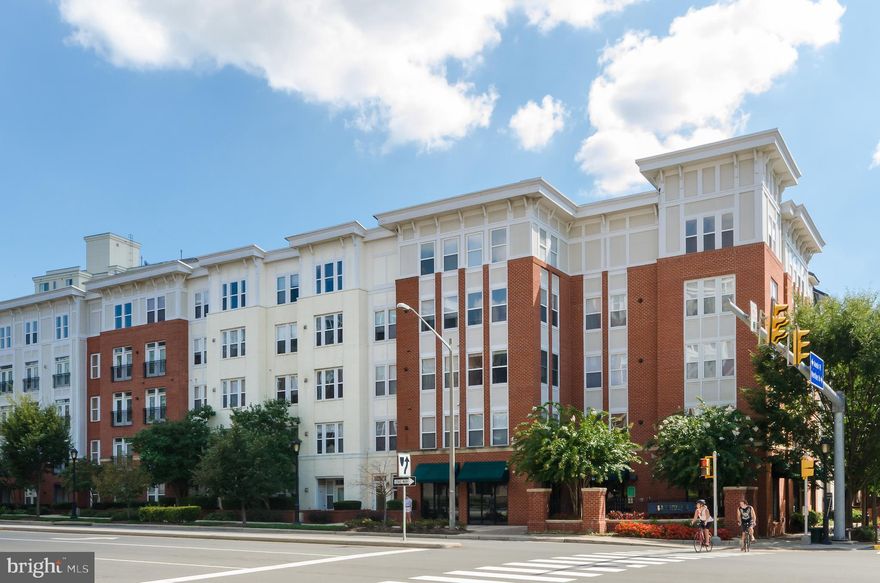 Enjoy convenient, low maintenance living at the Halstead at the Metro! A light-filled, corner unit with many NEW WINDOWS! Featuring tall ceilings, an updated kitchen, a master suite with walk-in closet, and full size washer & dryer. Guests will enjoy the privacy of their own bedroom and full bathroom separate from the master suite. Owner has replaced the range, dishwasher, washer/dryer, HVAC, carpet, and installed new closet organizers all in last three years! Amenities abound in THIS building -- fitness center, club room, party rooms, business center, indoor basketball court, library, outdoor pool, on-site concierge, and more! Conveniently located to Dunn Loring-Merrified Metro, I-66, I-495, other major roadways, shops, restaurants, and recreation, this location is a commuter's dream! Two assigned parking spaces in the attached, covered garage convey with the unit!