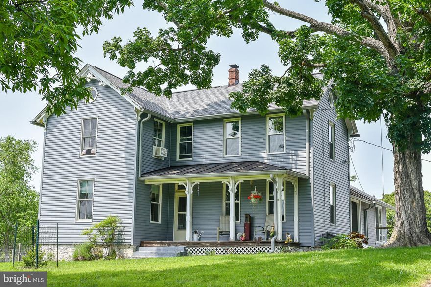 Idyllic Farmette Just Outside Shepherdstown! Escape to 11.39 acres of peaceful country living just minutes from historic Shepherdstown. This beautifully updated farmhouse blends modern comforts with charm, featuring new siding and a new roof. 

Inside, you'll find 3 bedrooms, an office, and 2 full baths. The spacious kitchen is designed for both function and style, featuring updated countertops, a gas stove, and a large island with an additional prep sink. The light-filled dining room is perfect for gatherings, while the family room, complete with a wood-burning stove and lovely views, creates a warm and inviting space.

Multiple outdoor areas, including a rear deck off the family room, a side deck off the office, and an upper-level balcony, provide serene spots to relax. A dream property for equestrians, homesteaders, and gardeners alike, this farmette is ready for goats, chickens, and horses with a 52'x 70' bank barn, a stable with 2 horse stalls, a tack room, storage room,  a riding ring and approximately 5 fenced acres. 
There are also three fenced gardens, a chicken coop with a run, and a variety of fruit trees and berry bushes, including pears, apples, peaches, blackberries, raspberries, strawberries, and lush Concord grape vines. The landscape bursts with seasonal color thanks to an array of perennials, including Russian Sage, Pearly Everlasting, Feverfew, Nigella, Echinacea, Sedum, Amaryllis Belladonna, Bleeding Heart, Hosta, Bupleurum, Yarrow, Knockout Roses, Catmint, and Dianthus.

Other features of this home include a UV light water purification system and a water softener. High-speed internet, attic storage, and ceiling fans.

Enjoy vibrant gardens, open spaces for your animals, and the tranquility of nature, all while being just a short drive from Shepherdstown’s charming shops, dining, and cultural attractions. This rare gem won’t last long—schedule your showing soon!