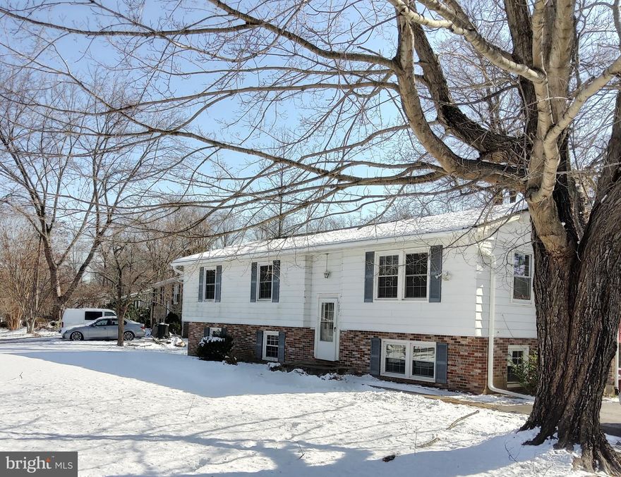 5 Bedroom 3 bath home on a corner lot in Chesapeake Heights. Great commuter location for Pax River/Metro areas. Multi level deck and large back yard. Upper level with full kitchen, 3 bedrooms, 2 baths and washer/dryer hookups. Walkout lower level with fully finished living area, 2 bedrooms, full bath, additional kitchen, laundry and a fireplace.   Each level can be separate living spaces. Property is NOT approved for 2 rental units. Property needs updating and is  being sold STRICTLY "As Is".   Price reflects condition.