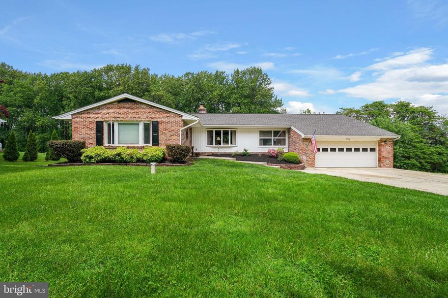 This charming ranch-style home offers a perfect blend of comfort and functionality. The open floor plan seamlessly connects the living and dining areas creating an ideal setting for gatherings. The kitchen is a chef's delight, equipped with built-in microwave, double oven, and dishwasher, along with an eat-in area and cozy brick fireplace. The outdoor space features a spacious composite deck and patio, perfect for entertaining or simply enjoying nature. The attached two-car garage with a front entry and concrete driveway ensures ample parking and easy access. The fully finished lower level, complete with a walkout entrance, offers FR, 2 flex spaces, half bath, storage room and pellet stove.  New well pump (2024). The septic, roof, siding and fascia have all been completed since current owner purchased in 2011.  One year home warranty.