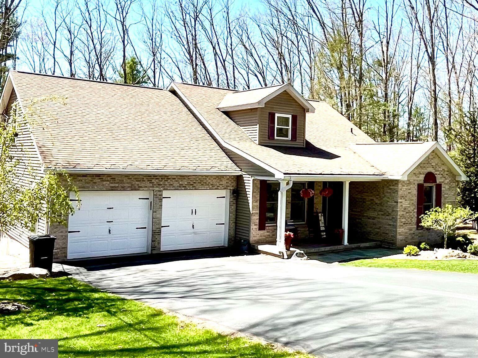 Move right into this charming 5 bedroom, 4 bathroom traditional home which boast more space than you could imagine! Your first floor living space features primary bedroom with ensuite, plus adjacent laundry room, two additional guest rooms and a full bath. Updated and modern kitchen that overlooks your dining space adjacent to the living area with cozy fireplace. Enter your second story for additional quest quarters with full bathroom and private bedroom. Additional bonus room, used as secondary family room to accommodate a large family, for gatherings or additional sleeping needs. Your finished lower level includes extra family and friends space, plus game room, complete with pool table. You will find an extra bedroom that can be converted into a den or man-cave. Consider your extra spaces for own gym, den, or bonus room and let your imagination run wild! Don't forget you will find two decks for your entertaining needs, or simply relaxation or a family BBQ. Your very own fire-pit and seating area to accommodate every need, plus an additional lot for your privacy!
Located in the gated, active community of Eagle Rock Resort, not only filled with the beauty and awe of nature, but includes many 4 season amenities, such as 27 holes of gorgeous golf courses, nature trails, skiing, expansive white sand beach on the lake, 3 outdoor pools, an indoor aquatic center, 4 covered bocce ball courts, tennis courts, corn hole courts, pickle ball courts, large equestrian center, hotel , activity center, and event venue at the Base Lodge and many community events throughout the year.
All of this is surrounded by the natural beauty and year-round amenities of Eagle Rock Resort, including 27 holes of golf, nature trails, skiing, a white sand beach, three outdoor pools, an indoor aquatic center, bocce ball courts, tennis, pickleball, a large equestrian center, hotel, activity center, and event venue at the Base Lodge. The community also hosts a wide array of events throughout the year.