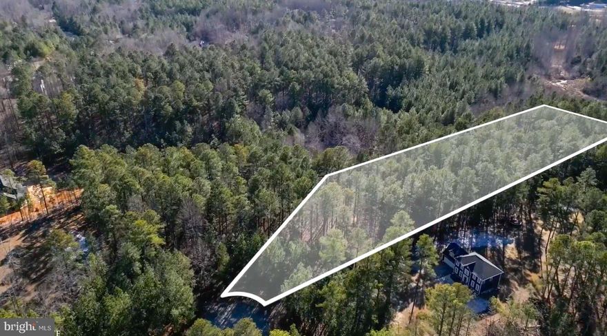 Beautiful water-access lot located in the sought-after Waters at Lake Anna community! This wooded cul-de-sac homesite offers a peaceful, private setting with a gently sloping topography—ideal for a future home. The lot perks for a 4-bedroom home and backs to a wooded common area, providing added rear privacy. Enjoy the convenience of a deeded boat slip (D-5) along with exceptional community amenities, including a boat ramp, tennis courts, swimming pool, clubhouse, walking trails, and a stunning sandy beach. Perfectly situated near shopping, dining, and local conveniences, this is an excellent opportunity to build and enjoy the Lake Anna lifestyle.