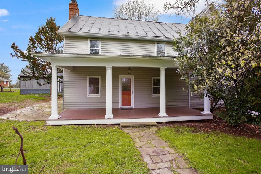 Welcome to Morrisonville!  This small enclave of homes will remind you of Waterford without the traffic and prices!  This house was originally built sometime prior to the civil war and has been added to and updated several times since then.  Author and journalist Russell Baker mentions this house in his Pulitzer Prize winning autobiography, "Growing Up".  The current owners did extensive work on it throughout their time here and have restored the log walls and stone fireplace, installed an antique mantel, replaced the flooring with reclaimed materials and modernized the plumbing and electric.  They have also made the most of the 1.19 acre lot with extensive landscaping and an orchard of fruit trees!  Several outbuildings provide space for limitless uses.  The current owner is a metal artist who's welded sculptures can be seen around the county.  One of the outbuildings is well set up to be a play room with finished space and a loft for a cool bedroom.  Close to Mountain Rd or Berlin Turnpike but out of the way and quiet.  This property is ready for new owners who will write the next chapter in it's storied history.