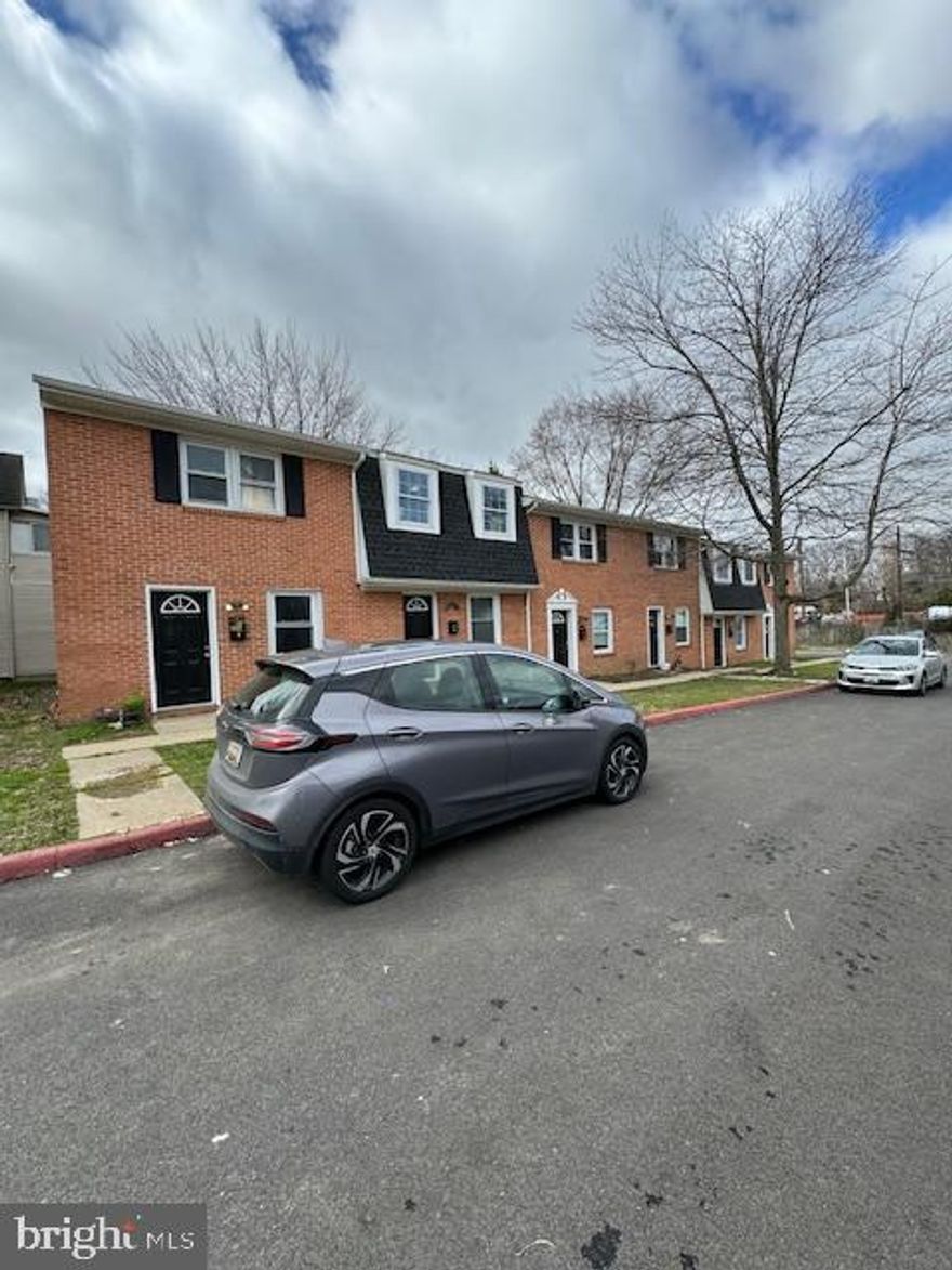 Eight unit Apartment/townhome complex in downtown Bel Air. The front house is a duplex and there are six townhomes. All units are currently rented. Private parking lot. Shared coin operated laundry.