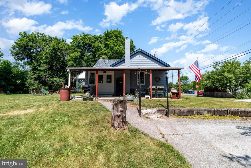 Looking for a small comfortable home in East Berlin on a quiet street? 420 South Avenue is the answer. With lots of parking choices, you’ll be ready to entertain friends and family on either of the two porches where you can share a cup of coffee or a cook-out/picnic. Recently remodeled inside (down to the studs) and out (new paint and roof), this home boasts open-concept living with a farmhouse style eat-in kitchen that has Corian and stainless countertops, a natural gas Gen Aire cooktop and lots of storage space. Mini split air conditioning keeps you cool and dry in the humid PA summers. LVT throughout offers easy care. There are two bedrooms and a full bath with a large tub on the second floor. And attic storage for off-season clothes and décor. The main floor includes an office/small bedroom, a den (currently a music room) and a bath with a tiled shower. In the lower level, you’ll find a wet bar with a huge sink, a large room waiting for your design ideas and the laundry/utility room with a half bath. There’s also a storage room that hosts the sump pump. Outside, are two garages with lots of space for your mechanic, carpenter and vehicles. A fire pit and gardening opportunities make outdoor living a great option. The property has lots of road frontage on South and Fourth Avenues. Take a tour soon to see why 420 South Avenue is a great home for you.