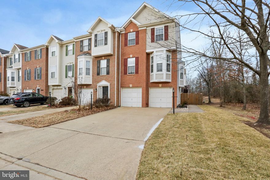 **Offer Deadline Sunday 2/1 at 6pm** Welcome to this well-maintained end unit townhome in the sought-after Ashburn Farm community. This move-in ready home offers over 2,000 square feet of thoughtfully designed living space with fresh paint throughout and brand new carpeting on the lower and upper levels (2026).
The main level welcomes you with gleaming hardwood floors that flow through the open living room, where two bay windows flood the space with natural light. The updated kitchen features crisp white cabinets, granite countertops, and stainless steel appliances (all replaced within the last few years, including the refrigerator in 2025, an induction stove/oven in 2024, dishwasher in 2024, and garbage disposal in 2023). Adjacent to the kitchen, the spacious dining area is bathed in sunlight from numerous windows and provides access to an expansive deck through sliding glass doors—perfect for indoor-outdoor entertaining. The deck includes stairs leading down to the private fully-fenced backyard.
Upstairs, the primary suite impresses with soaring vaulted ceilings, a generous walk-in closet, and a luxurious en suite bathroom featuring a dual vanity, soaking tub, and separate shower. Two additional bedrooms, another full bathroom, and a convenient upper-level laundry room complete this floor.
The walk-out lower level offers endless possibilities with a large recreation room that can serve as a home gym, office, second living space, or guest area. The blinds on the main and lower level were replaced in 2024. Step outside to the lower-level patio—ideal for relaxing or entertaining.
As an end unit, this home benefits from additional natural light and a surprisingly long driveway leading to the two-car front load garage. Recent major system updates provide peace of mind: new roof and water heater (2023), HVAC (2022), fence (2024), and outdoor aluminum trim (2025).
Ashburn Farm residents enjoy access to exceptional community amenities including pools, tennis courts, sports fields, playgrounds, and a pavilion. The location offers unbeatable convenience—positioned between Route 7 and the Greenway for easy commuting, less than 10 miles to Dulles International Airport, and approximately 4 miles to the Ashburn Metro station.
This turnkey home combines modern updates, flexible living spaces, and a prime location. Welcome Home! (Please note that all furniture in photos is virtually staged)