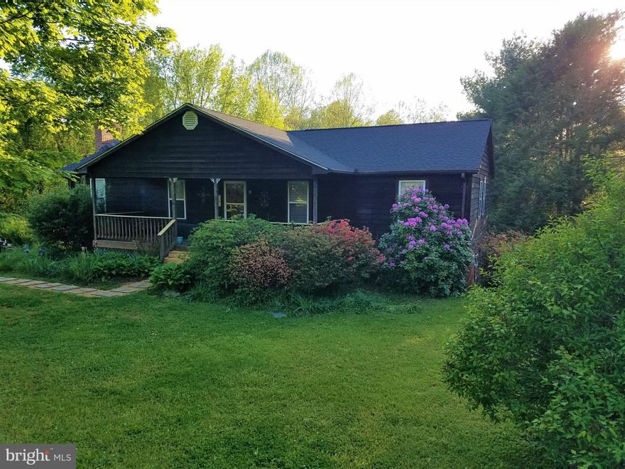WHAT A FIND ! Look No Further.... This Beautiful Cedar Ranch Is The One.... One Level Living With Master Bedroom, Master Bath, Two Other Guest Bedrooms, Full Hallway Bathroom, Large Living & Dining Room Combo With Cathedral Ceiling, Kitchen Right Off Dining Area To Make A Great Open Area Experience !! Kitchen Also Has A Washer/Dryer Hook-Up For A Double Stack Combo So You Don't Have To Run Up & Down The Stairs. Right Off Of Dining Area Is A Cute Quaint Deck To Bar-B-Que On In The Summer Or Just To Set & Enjoy The Serenity Around You Of Your Large Open Property & Beautiful Trees.  You Could Also Go Out On Your Front Porch To Relax On The Porch Swing In The Shade Of The Hot Sun With A Cold Beverage...... This Home Also Has A Partial Finished Basement With Three More Possible Bedrooms Or Hobby Rooms To Use As You Need, Loundre Area & Family Room With A Flue For Your WoodStove For Those Cold Winter Nights. Just Bring Your Own Finishing Touches.  With A Walkout Basement, You Could Make A Small Veggie Garden Out Back. This Is All On Almost 4 Acers So Bring The Horses & The Family To Enjoy !! Only 15 Min. To The Town Of Culpeper For Your Convenience & Comcast Too ! This Won't Last Long So I Wouldn't Wait..... New Lifetime Warranty Roof 2020, Some New Siding And Staining Protection 2020, New HVAC System 2018. This Home Has A Three Bedroom Perk