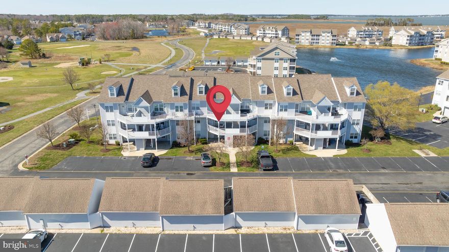 Welcome to this charming 2-bedroom, 2-bathroom condo nestled in the highly sought-after, AMENITY-RICH community of Bethany Bay in Ocean View, Delaware. Just minutes from the sandy shores of Bethany Beach, tax-free shopping, renowned restaurants, and endless outdoor activities, this home offers the perfect blend of relaxation and convenience. Step inside to an OPEN-CONCEPT living, dining, and kitchen space, perfect for entertaining or unwinding after a day at the beach. The eat-in kitchen features modern cabinetry and a pass-through window, creating a seamless flow into the cozy living area. Glass sliders lead to a bright and airy balcony, where you can sip your morning coffee while taking in SERENE VIEWS. Best of all, enjoy RESORT-STYLE LIVING with a community pool, tennis and pickleball courts, a 9-hole par-3 golf course, a modern fitness center, scenic walking and biking trails, a fishing pier, a kayak launch, and a boat ramp—all just steps from your door! The HOA ensures the community's beautifully maintained landscaping and hassle-free living. Schedule your tour today!